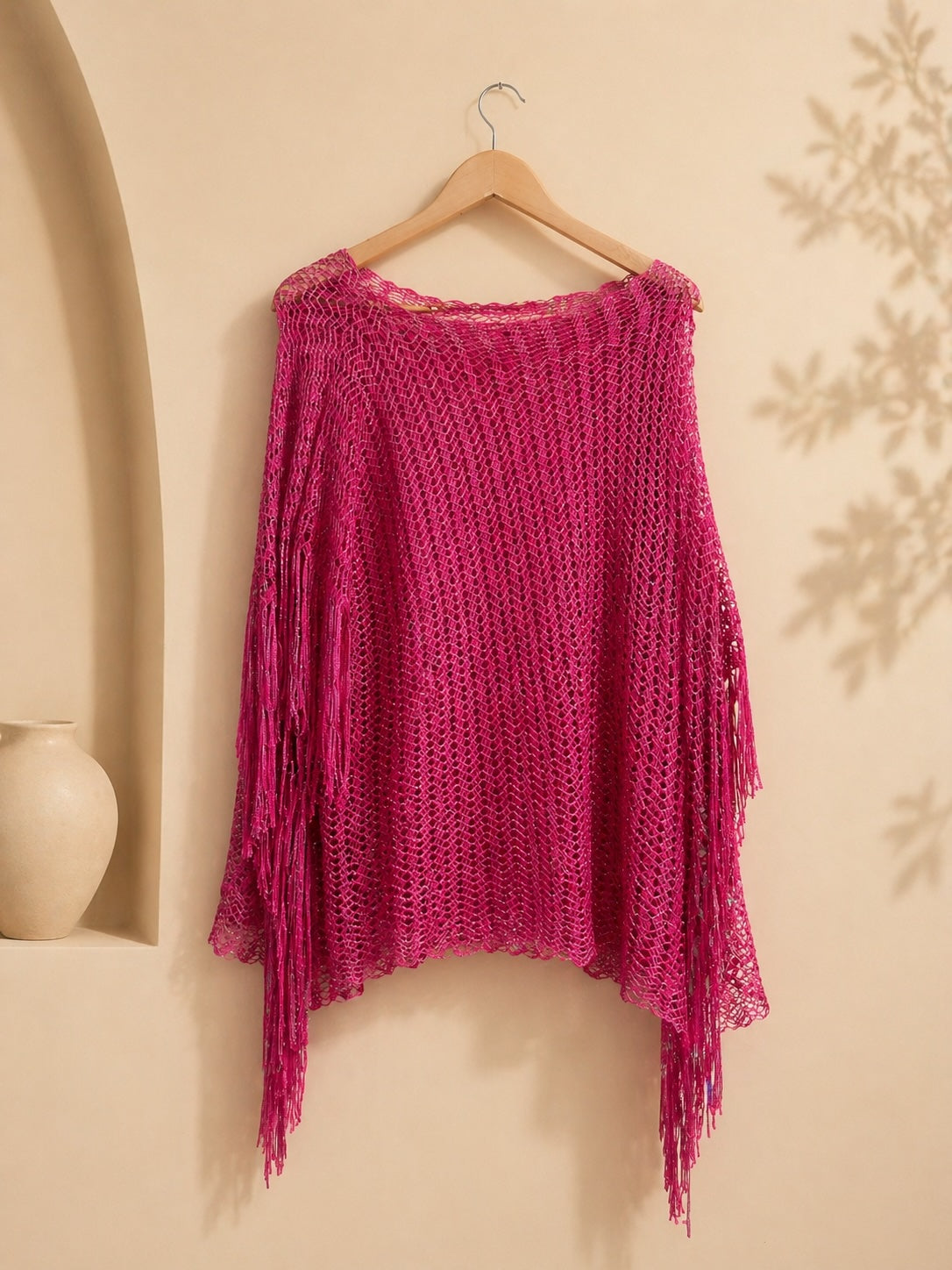 Poncho fucsia